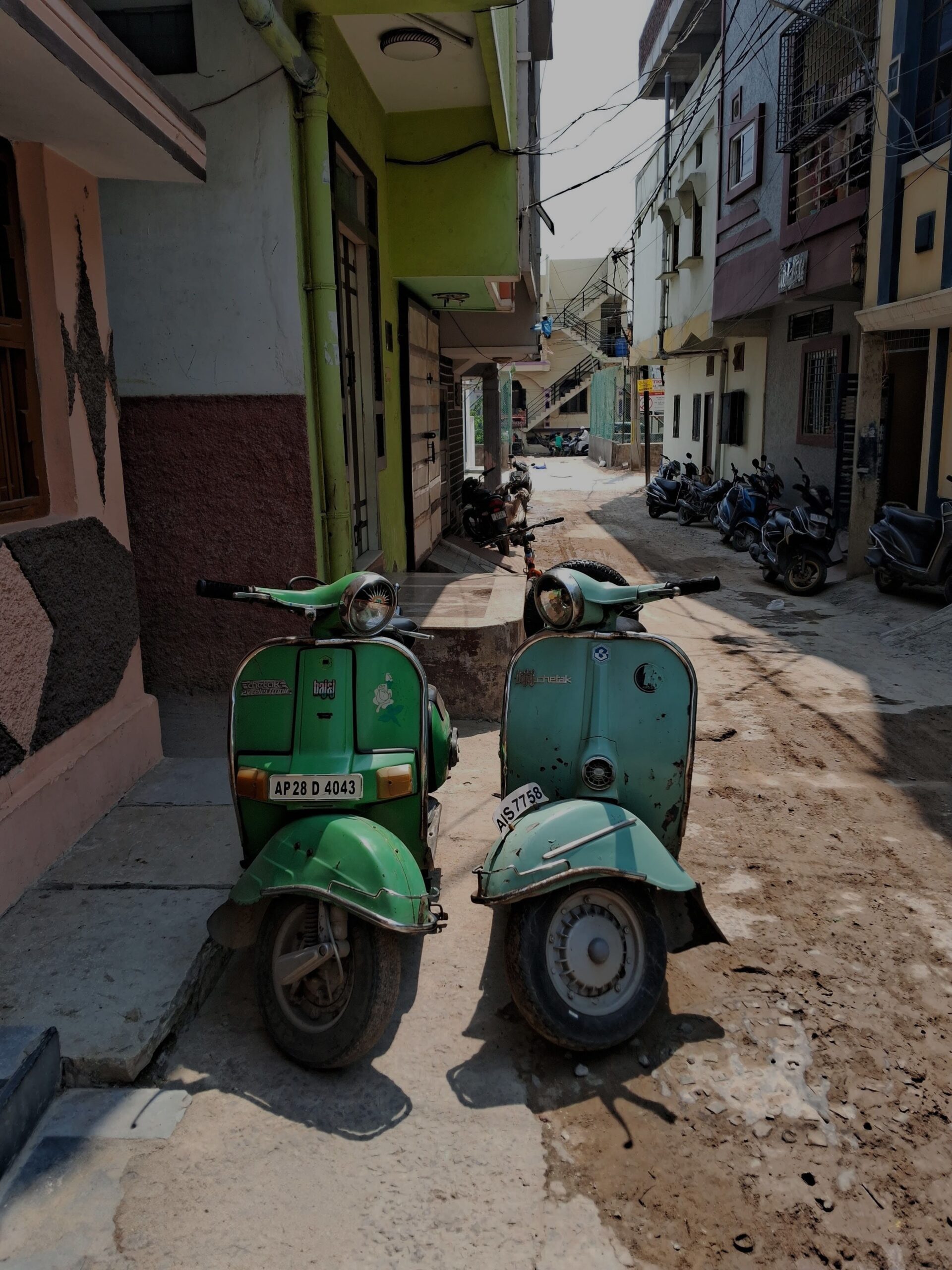 2 2-stroke scooters in one frame